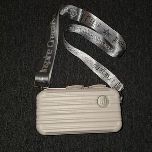 Elegant Cream Belt Bag with Silver Strap